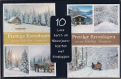 10 luxe kerst- en nieuwjaarskaarten in winterse landschappen. Tekst: "Prettige Kerstdagen en een Gelukkig Nieuwjaar" op elke kaart.