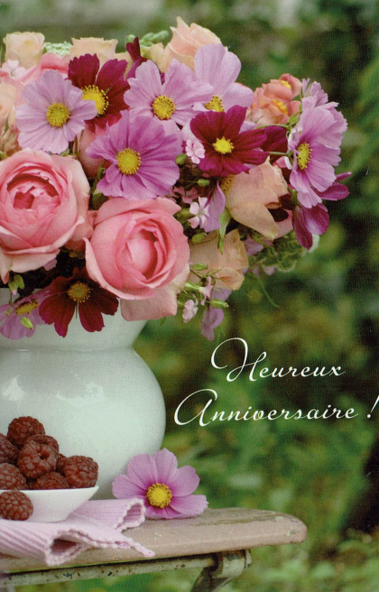 Franse Verjaardagskaart met weelderige bloemen.