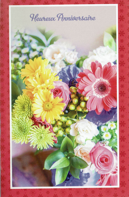 Franstalige bloemen verjaardagskaart met opschrift: Heureux Anniversaire.