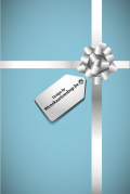 Blauw cadeautje met witte strik en kaartje. Tekst op kaartje: "Design by Wenskaartenshop.be".